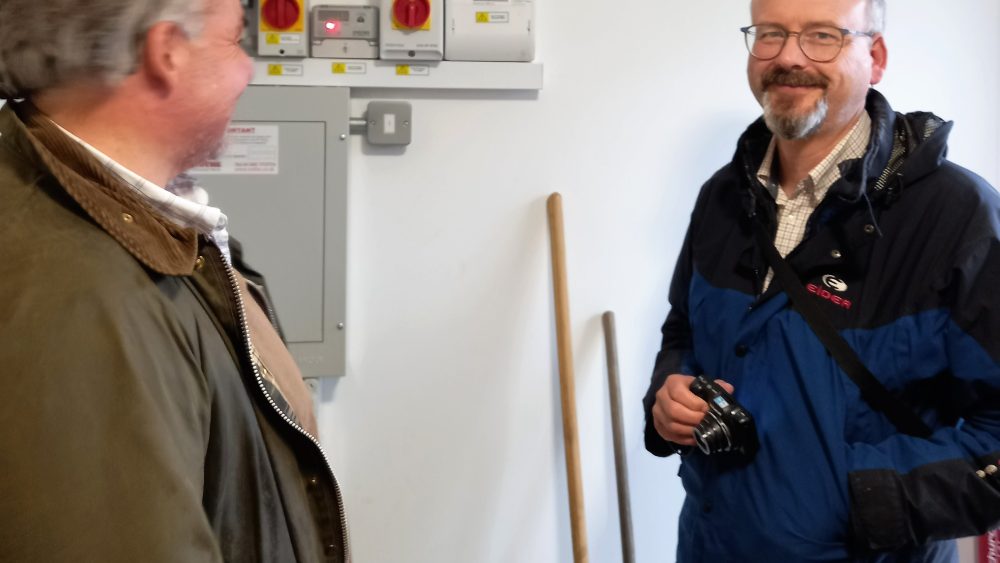 Low Carbon Dorset's Technical Officers, Erik and Matt, on a site visit.